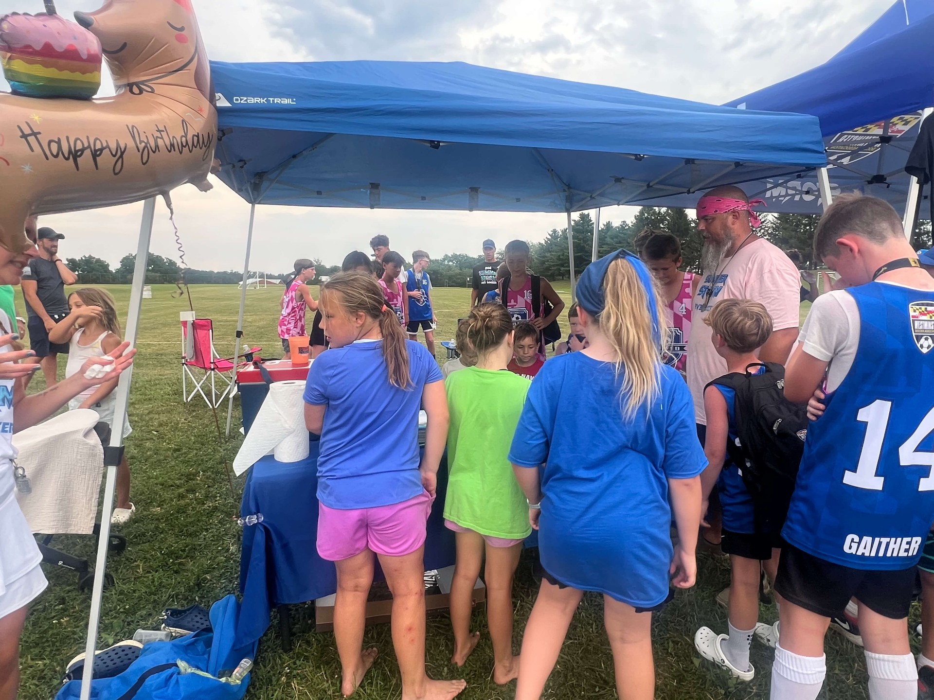 2025 — Players gathered under the Storm tent between games