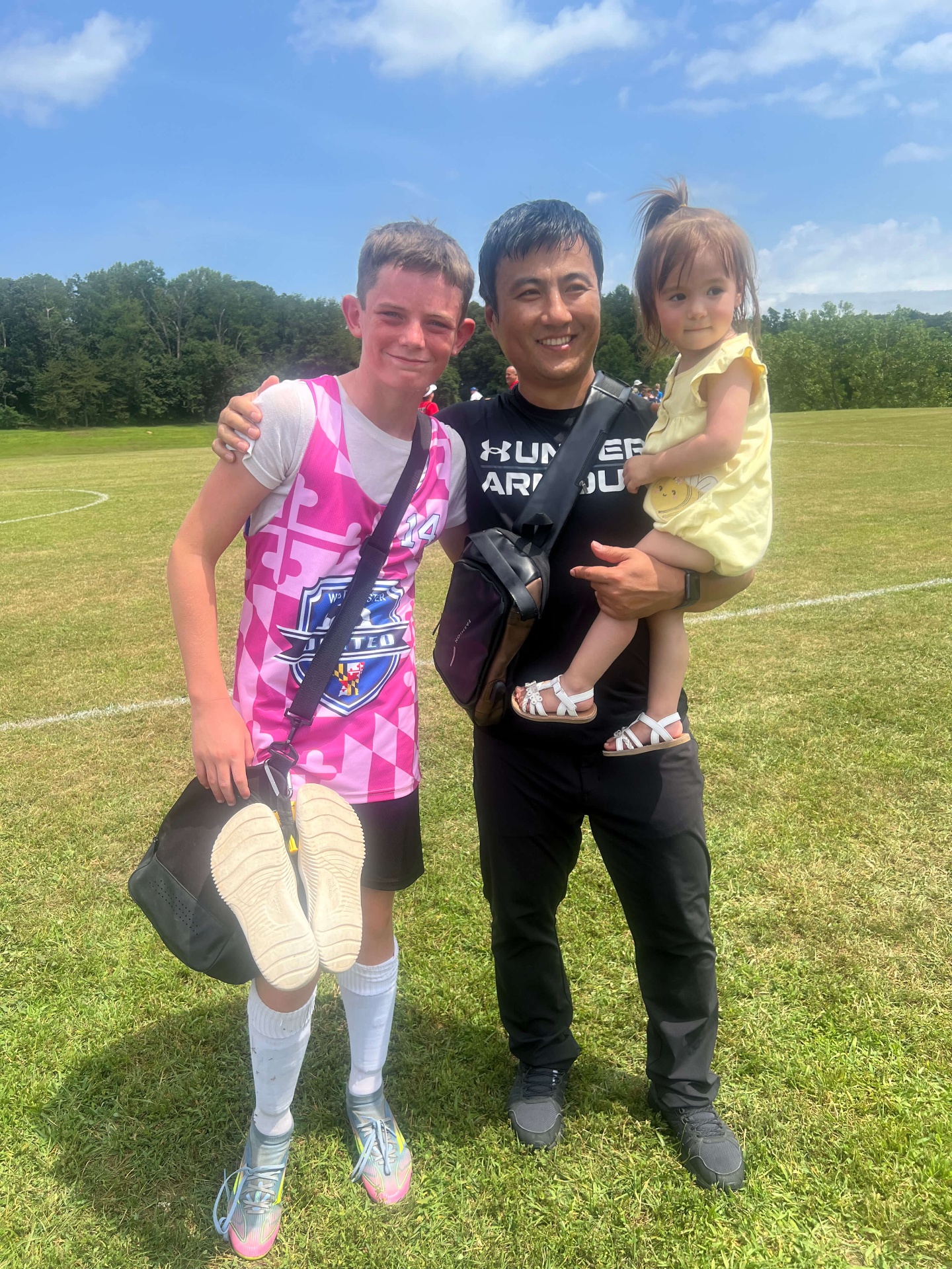 Player and family on the sideline after a match