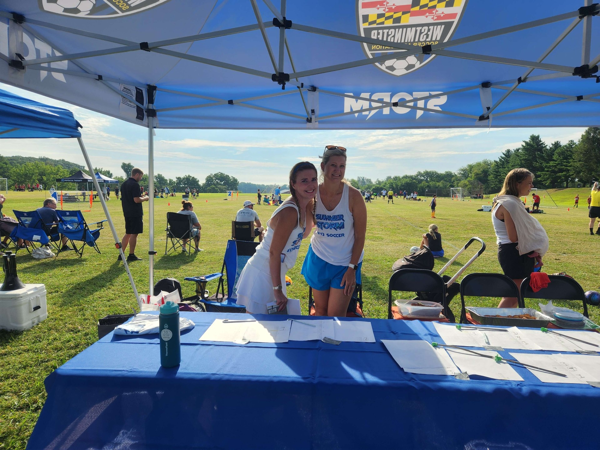 Summer Storm volunteers running the registration tent